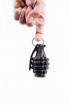 hand-holding-a-grenade-1411373825Xtf
